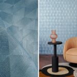 Blauw geometrisch Optique2-M40D behang met reliëfstructuur in een modern interieur met oranje fauteuil en zwart bijzettafeltje.
