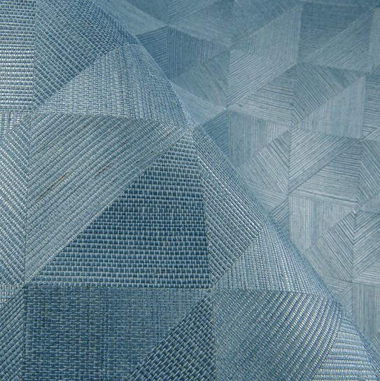 Detailopname van de textuur en geometrische patronen op het blauwe wandbekledingsmateriaal Optique2-M40D-3.
