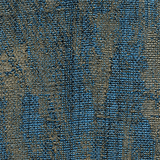 Textuur van tapijttegel VP-723-14 met een gemêleerd patroon in blauw en bruin.