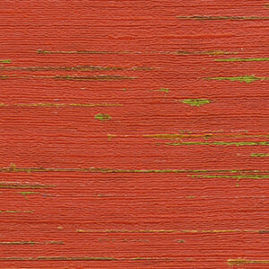 Textuur van het oppervlak van VP-851-11, met horizontale rood-oranje en groene strepen in een houtachtig patroon.
