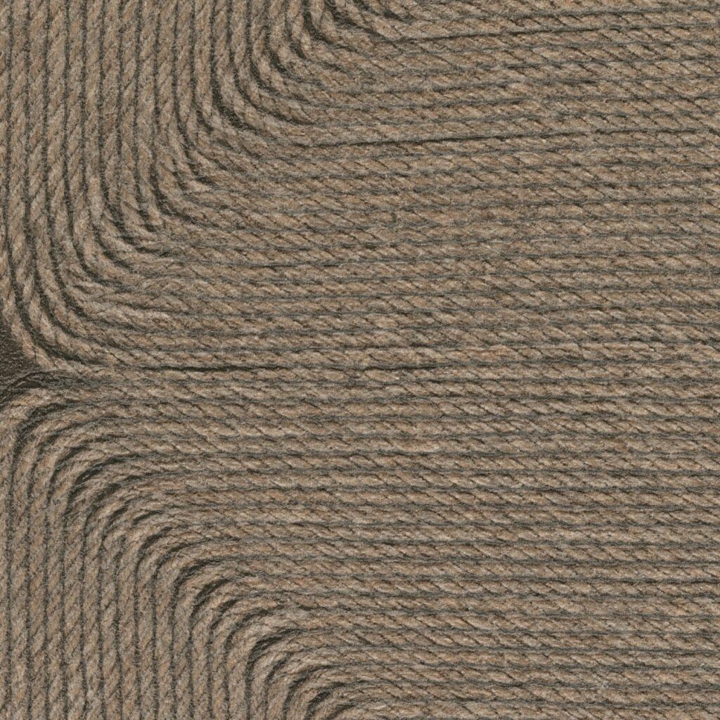 Detailopname van het structuurpatroon van het Elitis Cordes Sensibles Cocon VP 994-80 wandpaneel, ontworpen door Véronique de Soultrait.