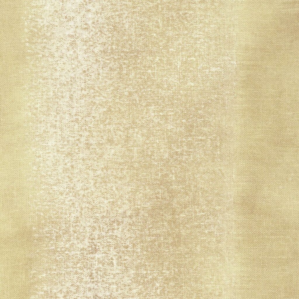 Beige Elitis Ephemere Univers LI 895 02 stof met een subtiel verweerd structuurpatroon.