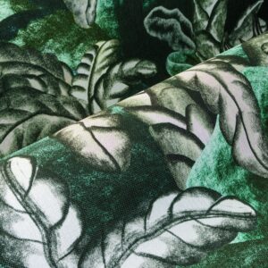 Detail van het Arte Balata Garden dessin met een print van gestileerde groene bladeren op textiel.