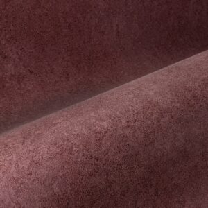 Detailopname van de roodbruine Arte Essentials Kaolin Calcaire Stucco wandbekleding met een licht ruwe textuur.