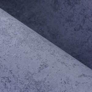 Detail van de Arte Essentials Kaolin Calcaire Stucco wandbekleding met een grijsblauwe, kalkachtige textuur.