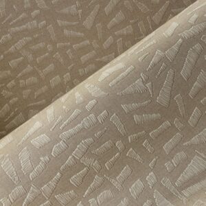 Detailopname van de Arte Textura Ignis Kona 81561A wandbekleding met een reliëfstructuur in beige tinten.