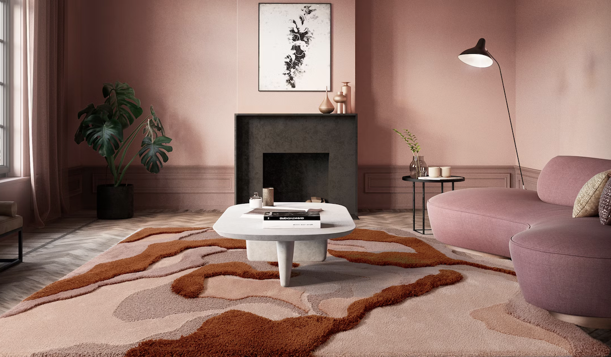 Stijlvol interieur met het Limited Edition Arcadia 24295 Buningh vloerkleed in warme aardetinten binnen een roze woonkamer.