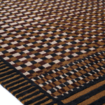 Hoek van het geruite vloerkleed Elitis Sento TA 143-74-04