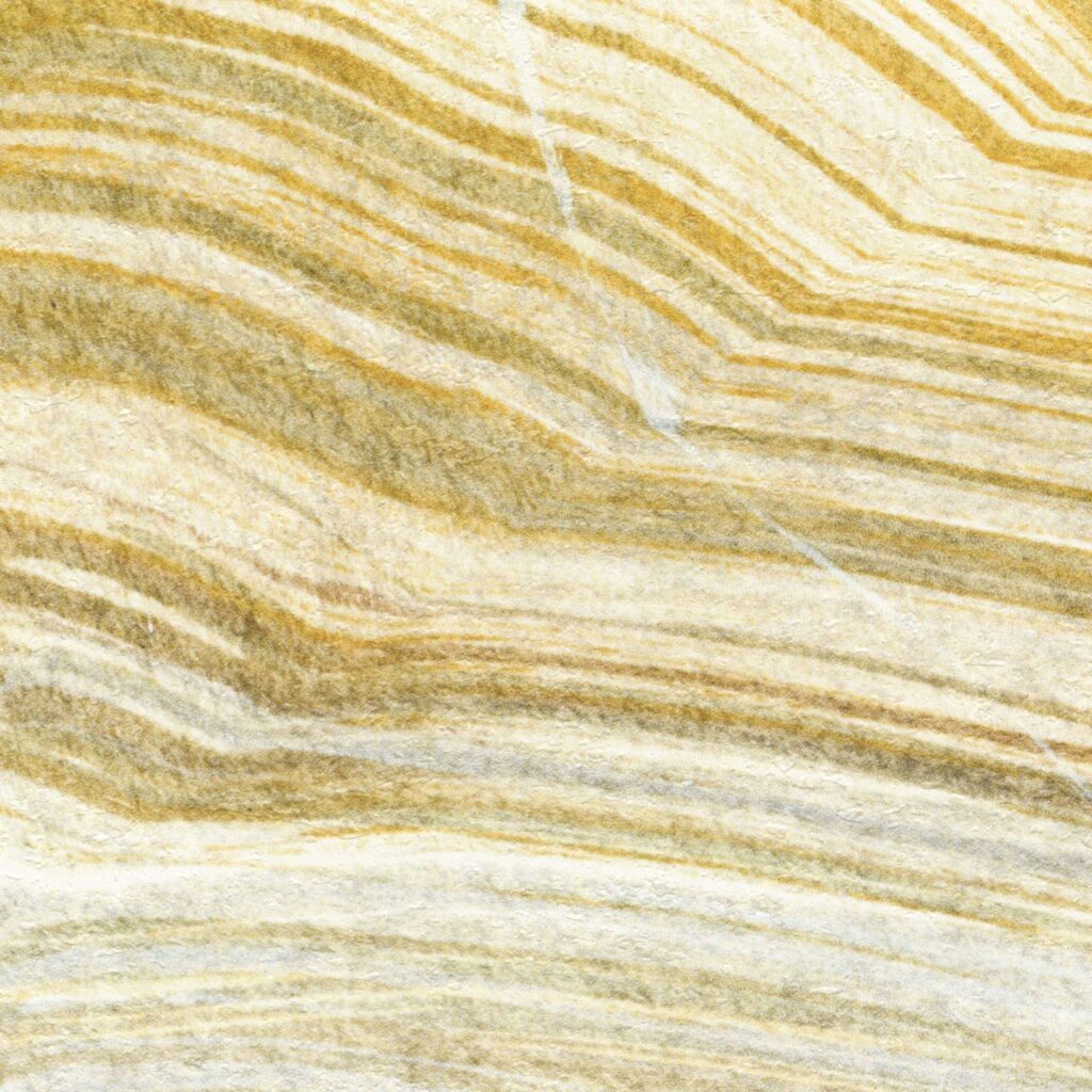 Kleurdetail van Elitis Terres emmêlées panorama behang van een gesteente in goud en groen