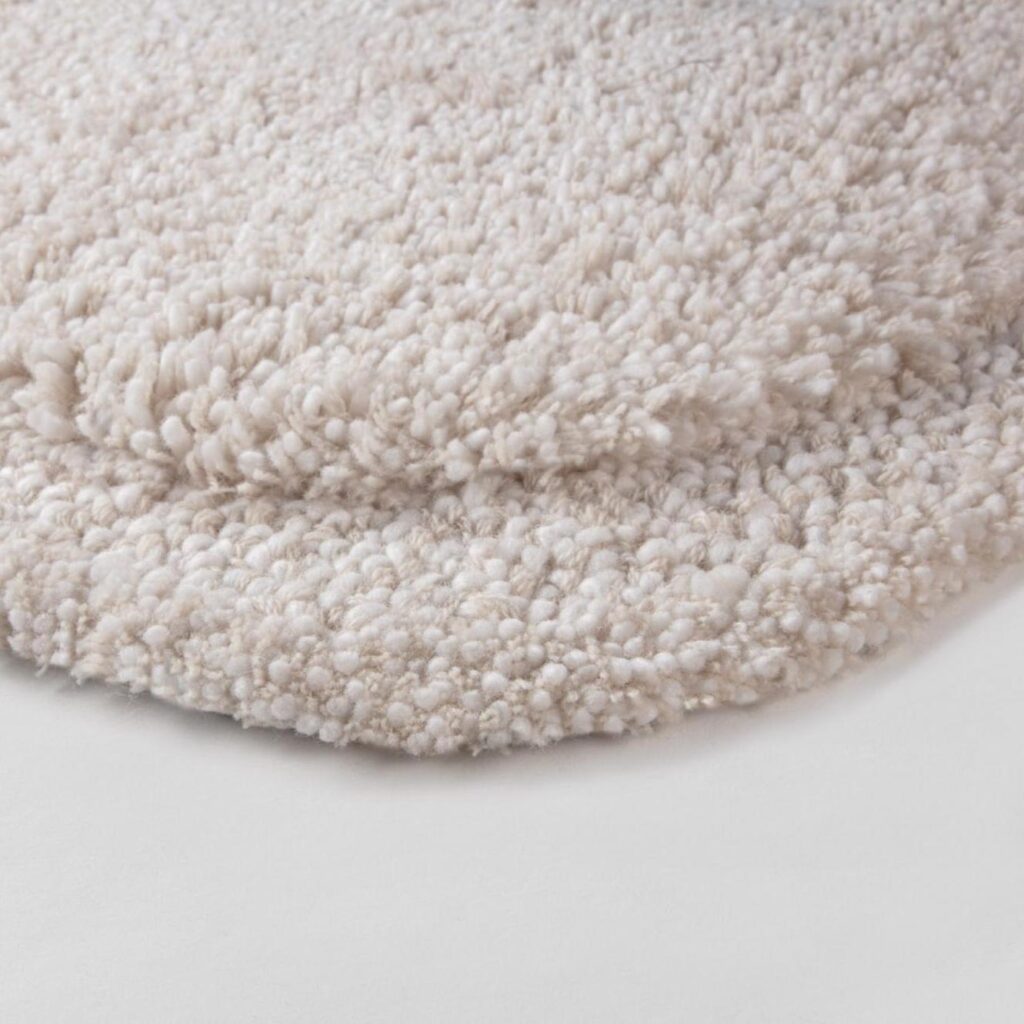 Detail van het creme kleurige Limited Edition Abstract Maya ASO1612186 Cream Organic 16 vloerkleed