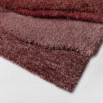 Detail weergave van het Limited Edition vloerkleed Arcadia ACR41317 Rosewood Rectangle in de kleur rood