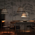 Eetkamer met op de muur het Andrew Martin behang mythical-land-peat in grijs wit
