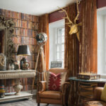Interieur weergave van het Andrew Martin library-multi behang